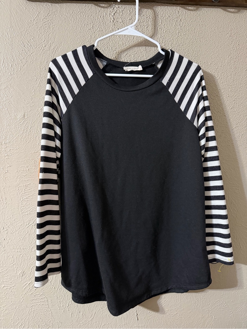 First Look Black Top with Black-and-White Striped Raglan sleeves Y2K